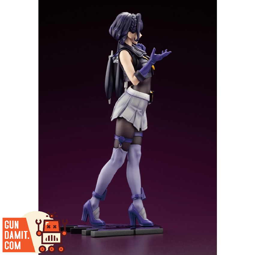 Anime girl figure with dynamic pose and detailed metallic purple costume Anime girl figure with dynamic pose and detailed metallic purple costume