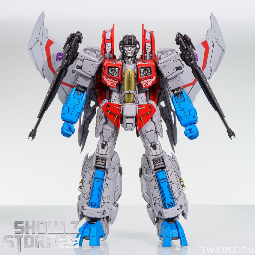 Starscream robot in dynamic attack pose with extended weapons Starscream robot in dynamic attack pose with extended weapons