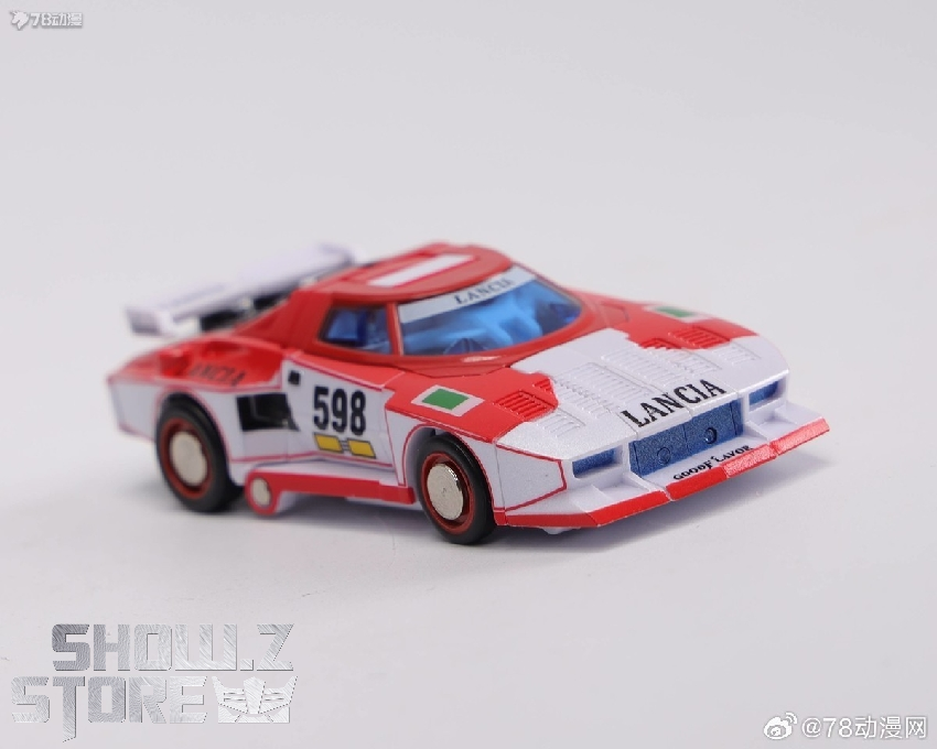 Blue H49M Wheeljack robot shown with complete transformation sequence Blue H49M Wheeljack robot shown with complete transformation sequence