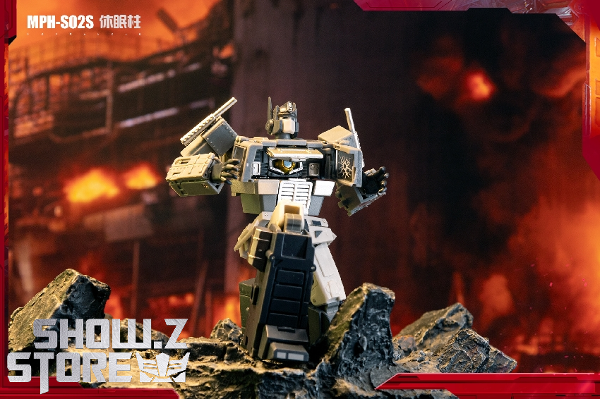 MPH Studio Optimus Prime robot in combat stance with fire backdrop MPH Studio Optimus Prime robot in combat stance with fire backdrop