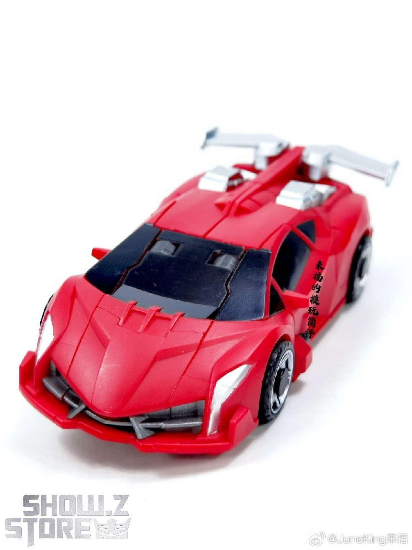 Red Sideswipe sports car mode black window detail Red Sideswipe sports car mode black window detail