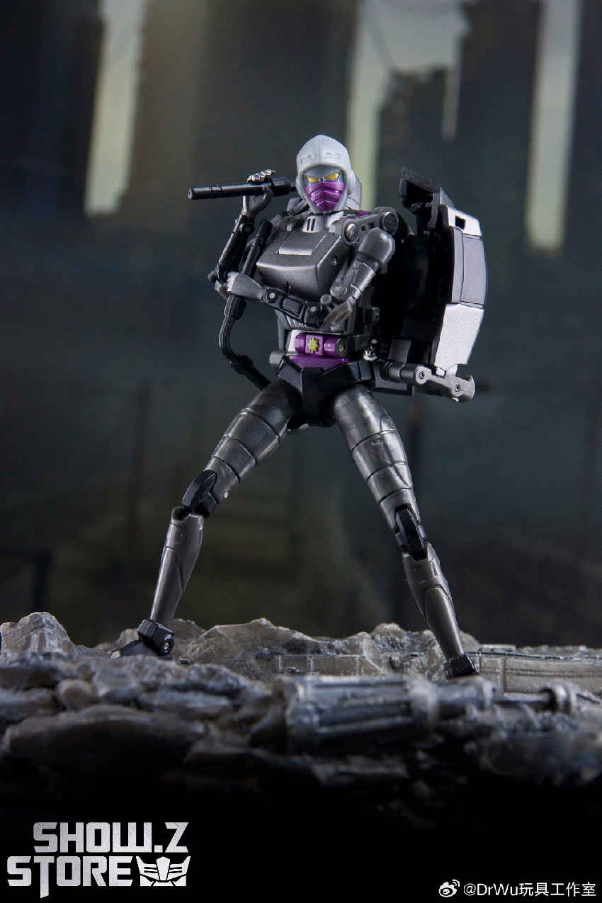 Night Nightbird black purple robot standing on rocky terrain Night Nightbird black purple robot standing on rocky terrain