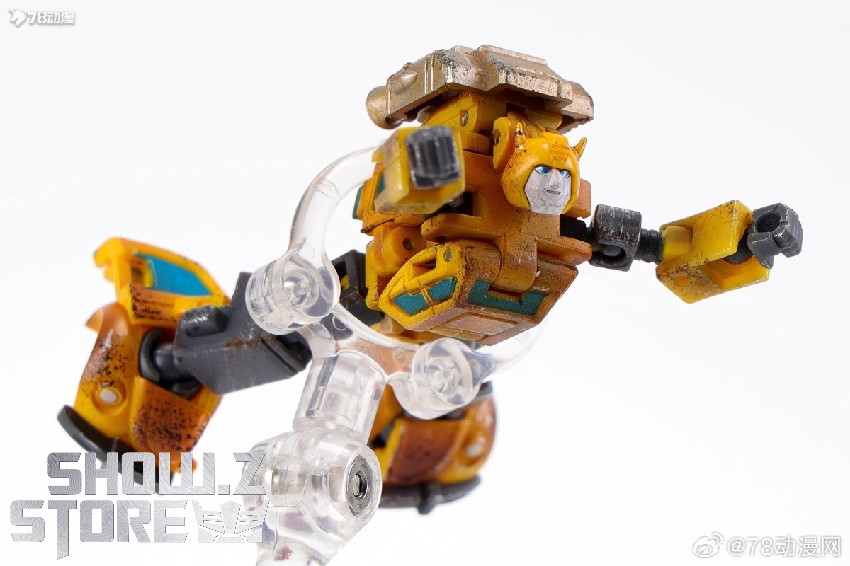 Yellow Bumblebee robot transformation showing gray armor detail inclusions Yellow Bumblebee robot transformation showing gray armor detail inclusions