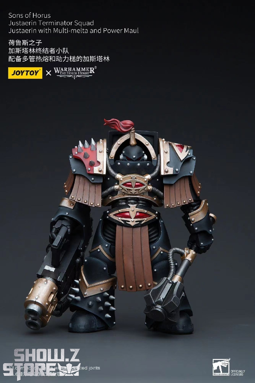 Front-facing Warhammer Sons of Horus Space Marine collectible model with weapons Front-facing Warhammer Sons of Horus Space Marine collectible model with weapons