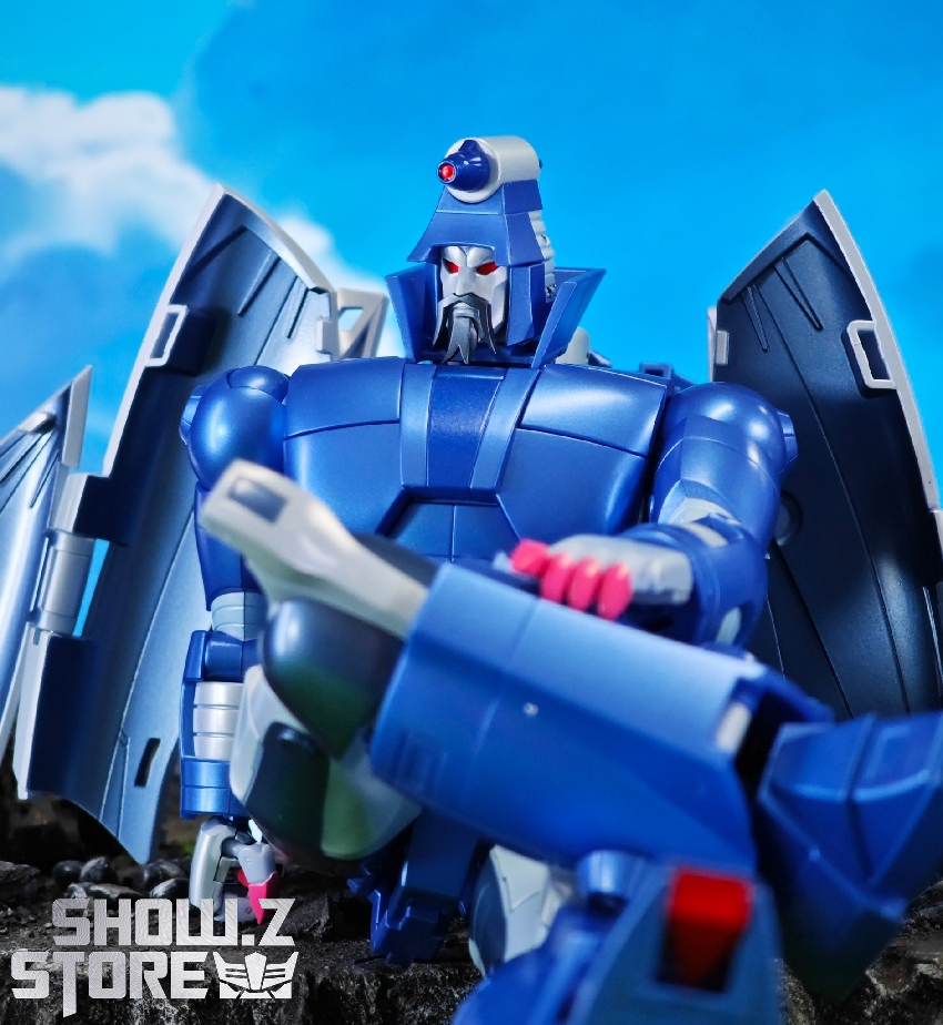 FansToys Scourge blue robot mid-flight pose blue sky background FansToys Scourge blue robot mid-flight pose blue sky background