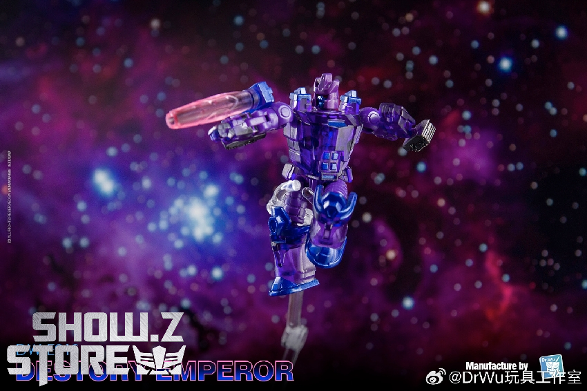 Silver metallic robot Galvatron form with orange cannon weapon attachment Silver metallic robot Galvatron form with orange cannon weapon attachment