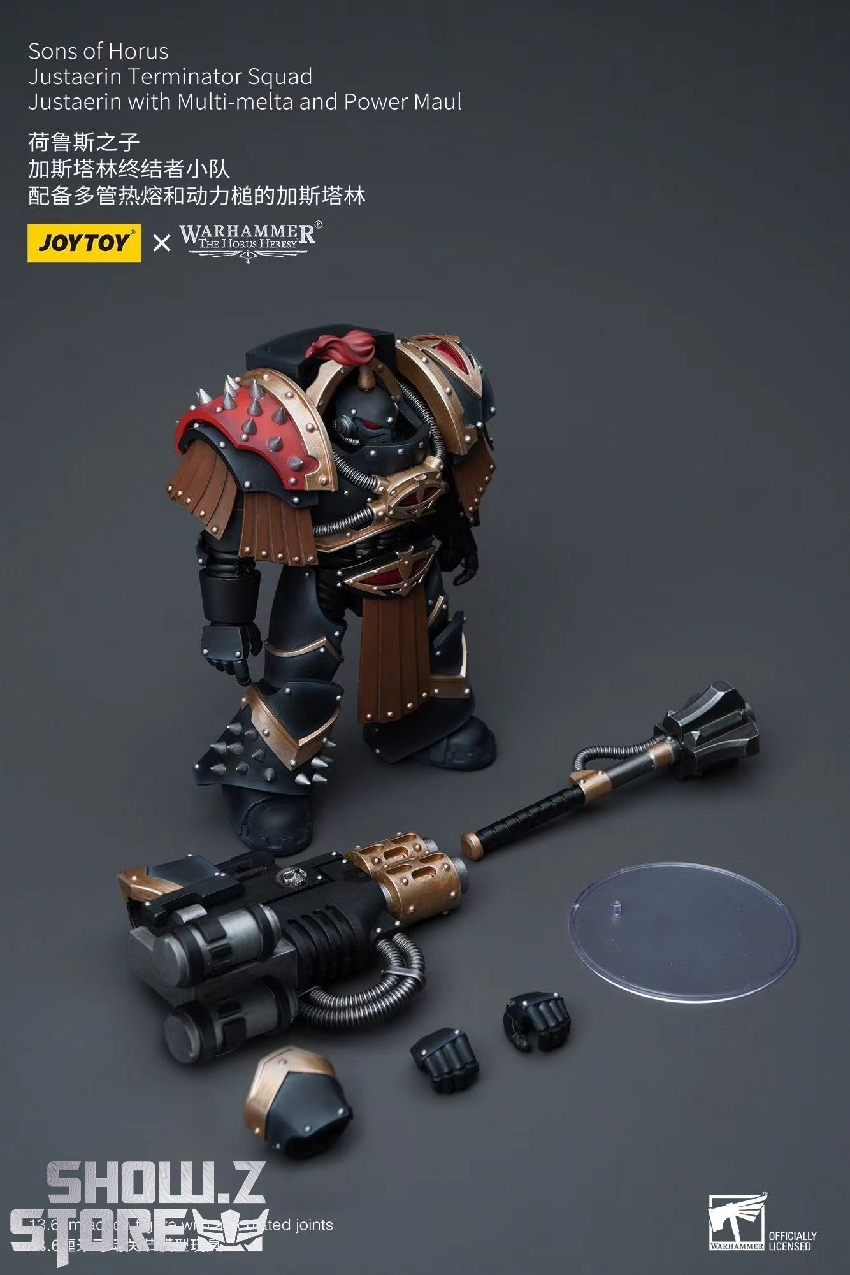 Close-up view of intricate Warhammer 40K Sons of Horus armor painting details Close-up view of intricate Warhammer 40K Sons of Horus armor painting details