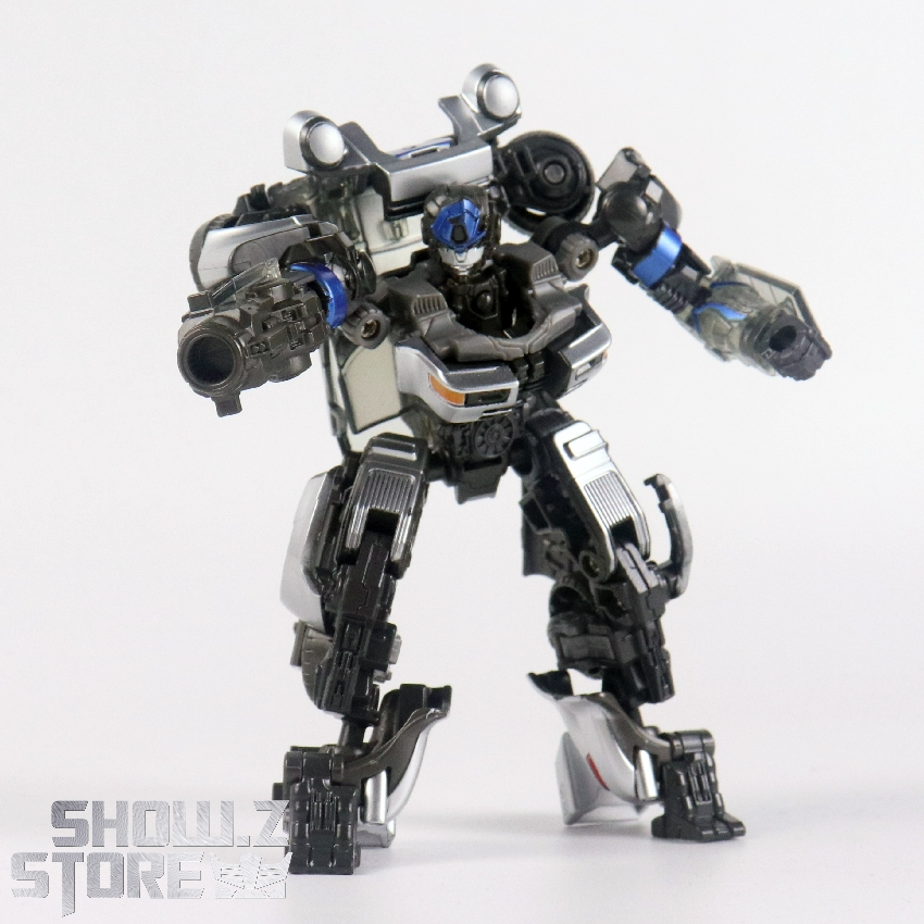 Robot stance demonstrating articulation range and sports car kibble Robot stance demonstrating articulation range and sports car kibble