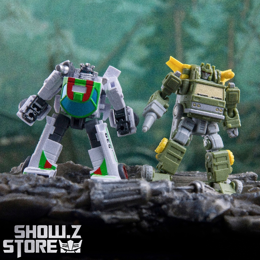 Multiple Transformers robots with yellow and grey color scheme standing Multiple Transformers robots with yellow and grey color scheme standing