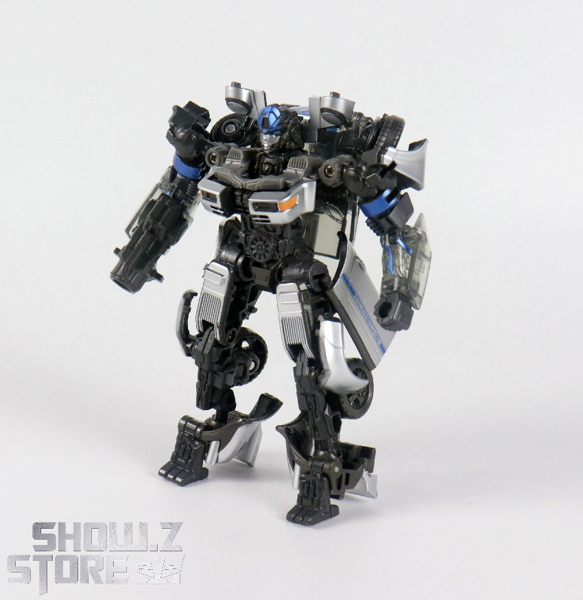 Front-facing robot showing transformation detailing and black accents Front-facing robot showing transformation detailing and black accents