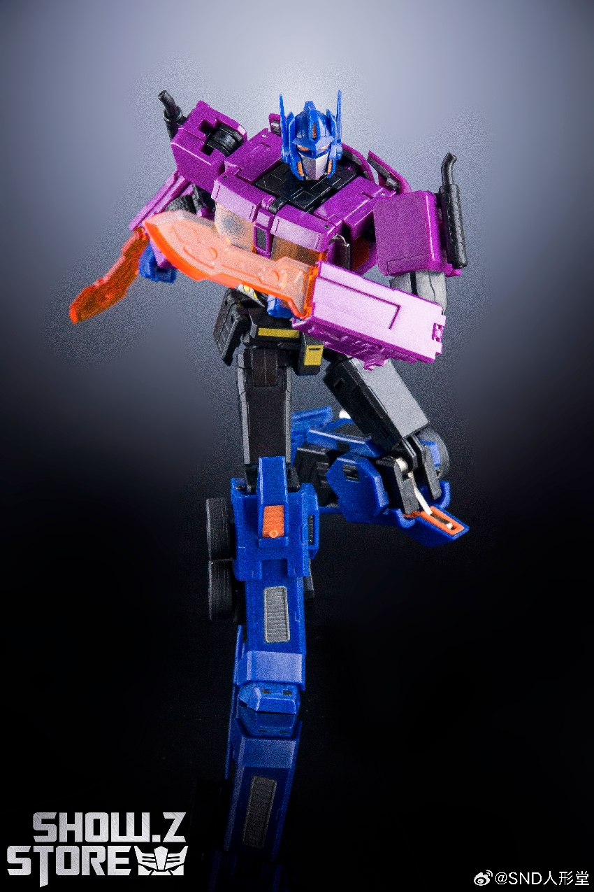 Purple and blue Masterpiece robot in dynamic fighting stance with weapons Purple and blue Masterpiece robot in dynamic fighting stance with weapons
