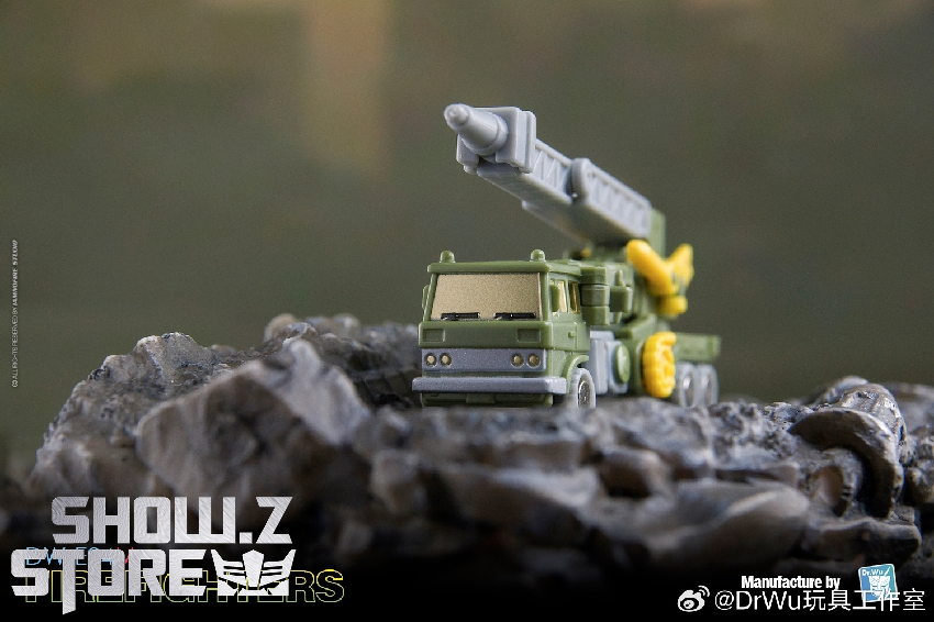 Military truck robot with yellow hydraulic arm and grey base Military truck robot with yellow hydraulic arm and grey base