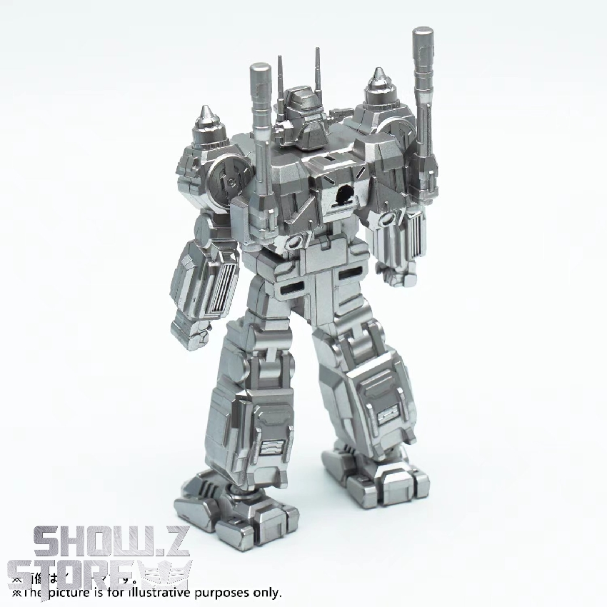 Silver Diaclone GX robot keychain shown in dynamic standing pose Silver Diaclone GX robot keychain shown in dynamic standing pose
