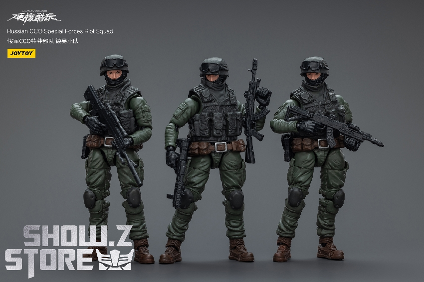 Equipped soldier figure with rifle and tactical gear standing in combat position Equipped soldier figure with rifle and tactical gear standing in combat position