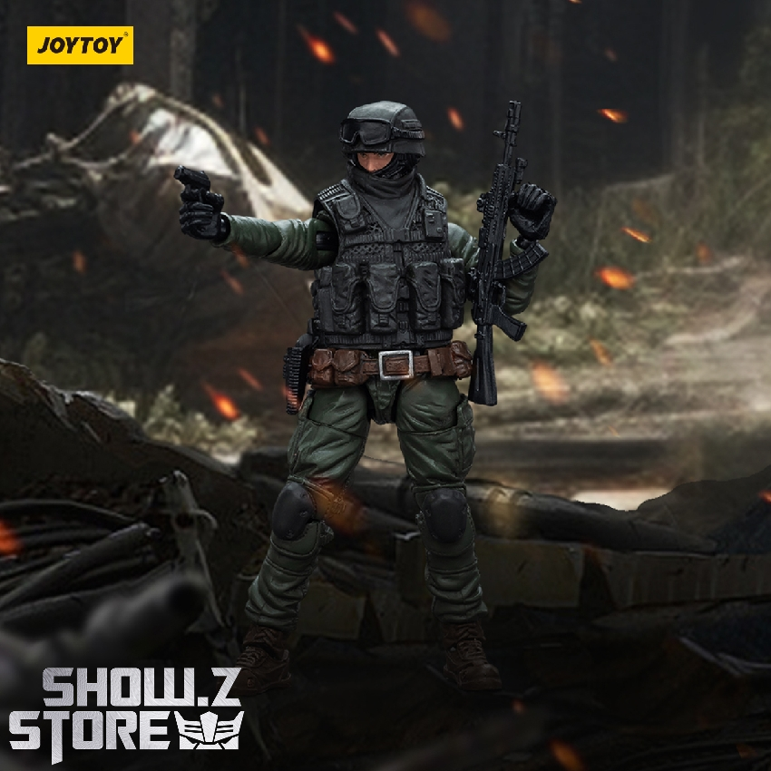 Special operations soldier in field uniform with armed rifle in combat position Special operations soldier in field uniform with armed rifle in combat position