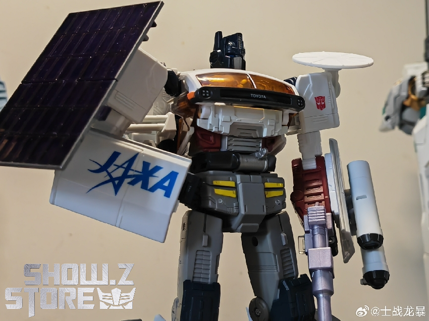 Optimus Prime robot with solar panel displaying transformation details Optimus Prime robot with solar panel displaying transformation details