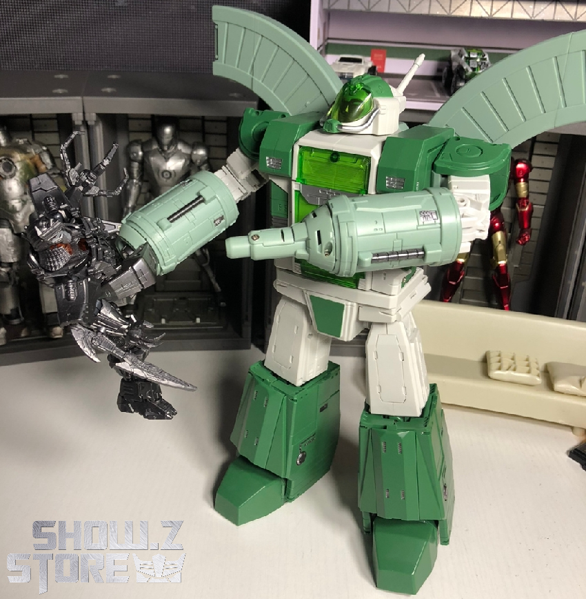 Green building mode robot with extended platform and white structures Green building mode robot with extended platform and white structures