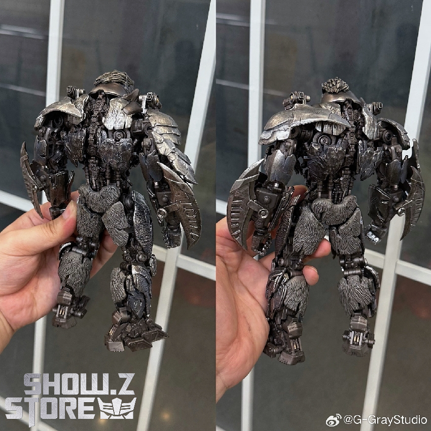 Black Apelinq robot warrior from multiple angles with weathered finish Black Apelinq robot warrior from multiple angles with weathered finish
