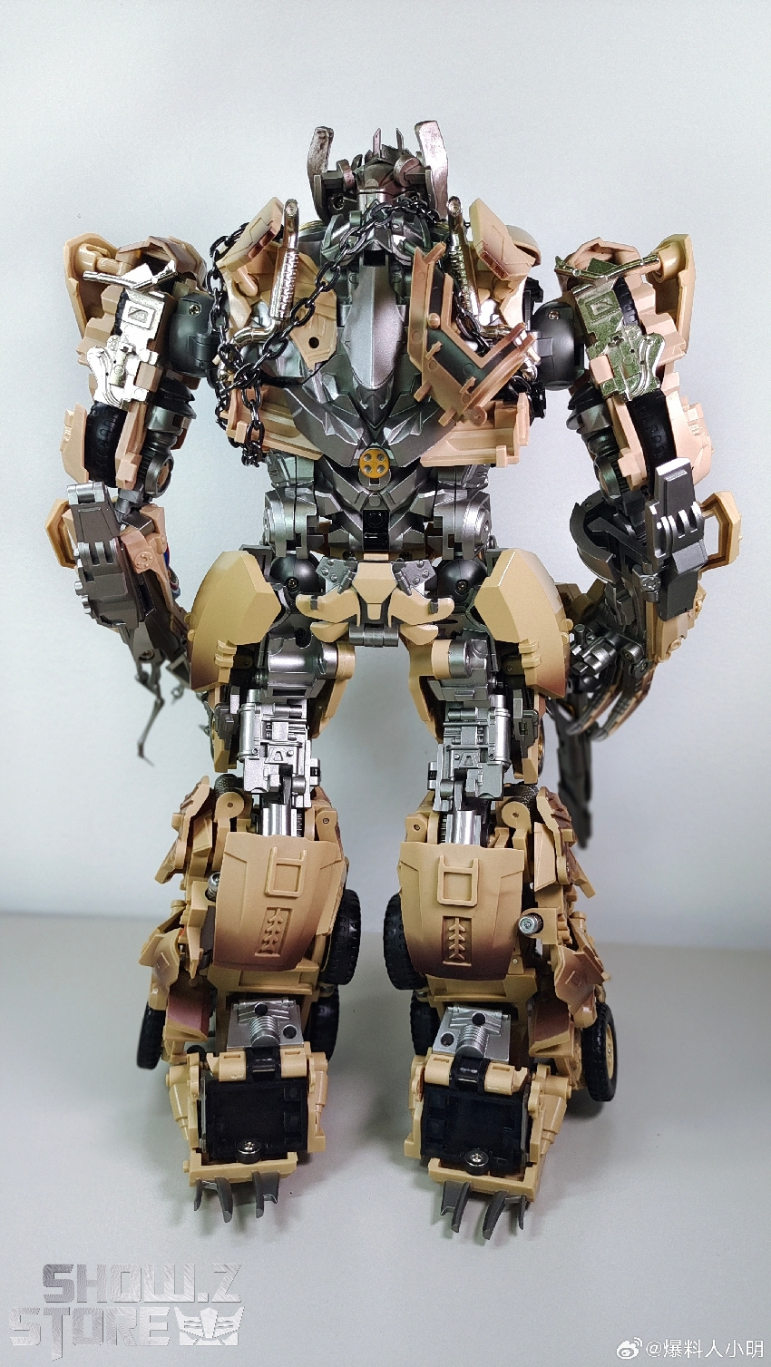 Megatron DP-01 tan brown weathered robot action figure display Megatron DP-01 tan brown weathered robot action figure display