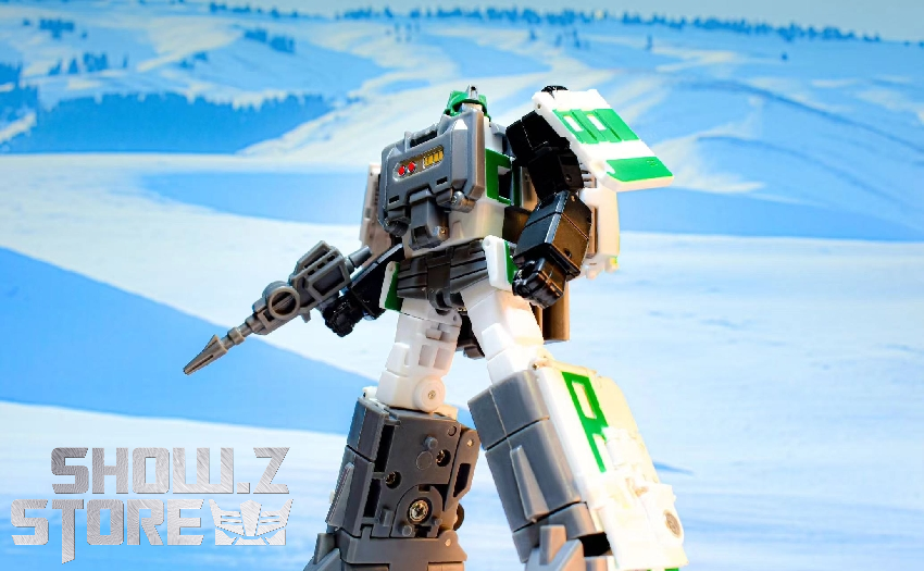 Blue robot Getsuei and white green Yukikaze figures in transformation mode Blue robot Getsuei and white green Yukikaze figures in transformation mode