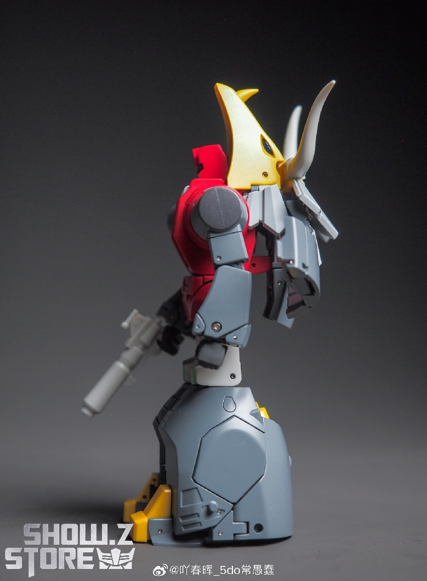 NewAge H63 Gorgo Slag red robot back view showing yellow and orange highlights NewAge H63 Gorgo Slag red robot back view showing yellow and orange highlights