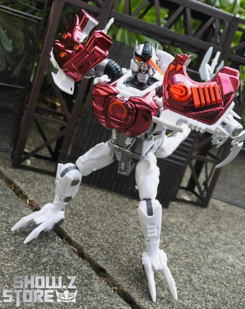 TransMetal Dinobot II red white articulated action pose detail TransMetal Dinobot II red white articulated action pose detail