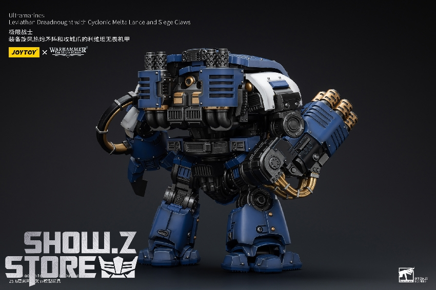 Space marine figure in dynamic pose showcasing blue armor chapter insignia trim Space marine figure in dynamic pose showcasing blue armor chapter insignia trim