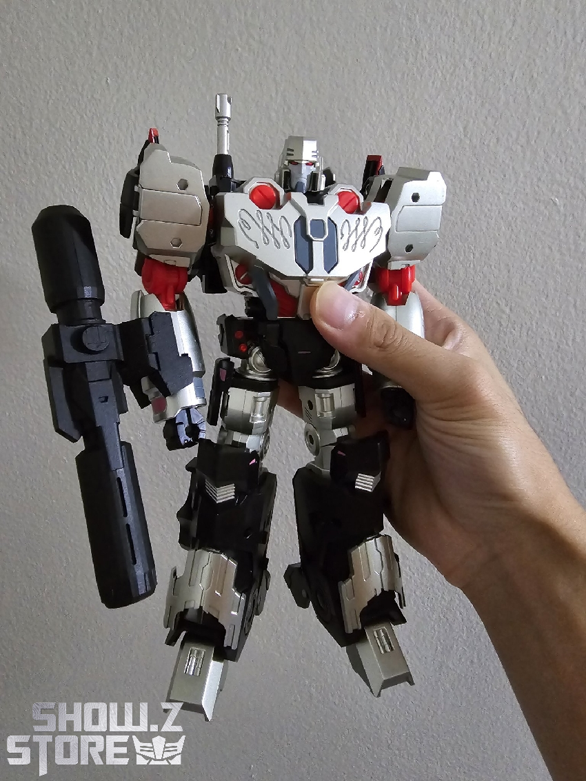 R-28 Tyrantron in vehicle transformation showcasing pink metallic finish details R-28 Tyrantron in vehicle transformation showcasing pink metallic finish details
