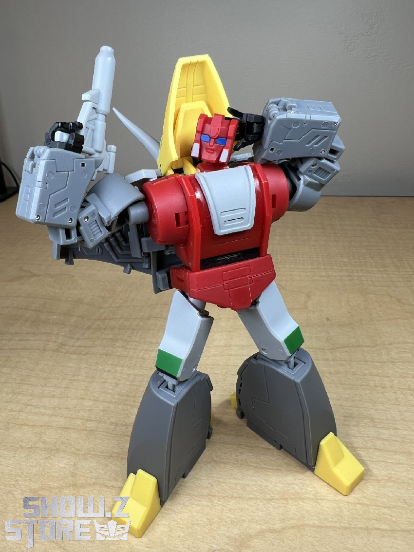 Red dinosaur Dinobot displayed from side angle showing mechanical details Red dinosaur Dinobot displayed from side angle showing mechanical details