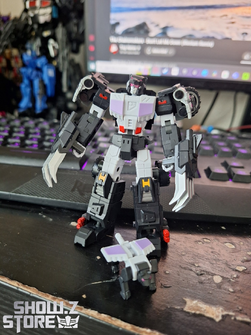 Mastermind Creations truck robot Megatron with red and metallic color scheme Mastermind Creations truck robot Megatron with red and metallic color scheme