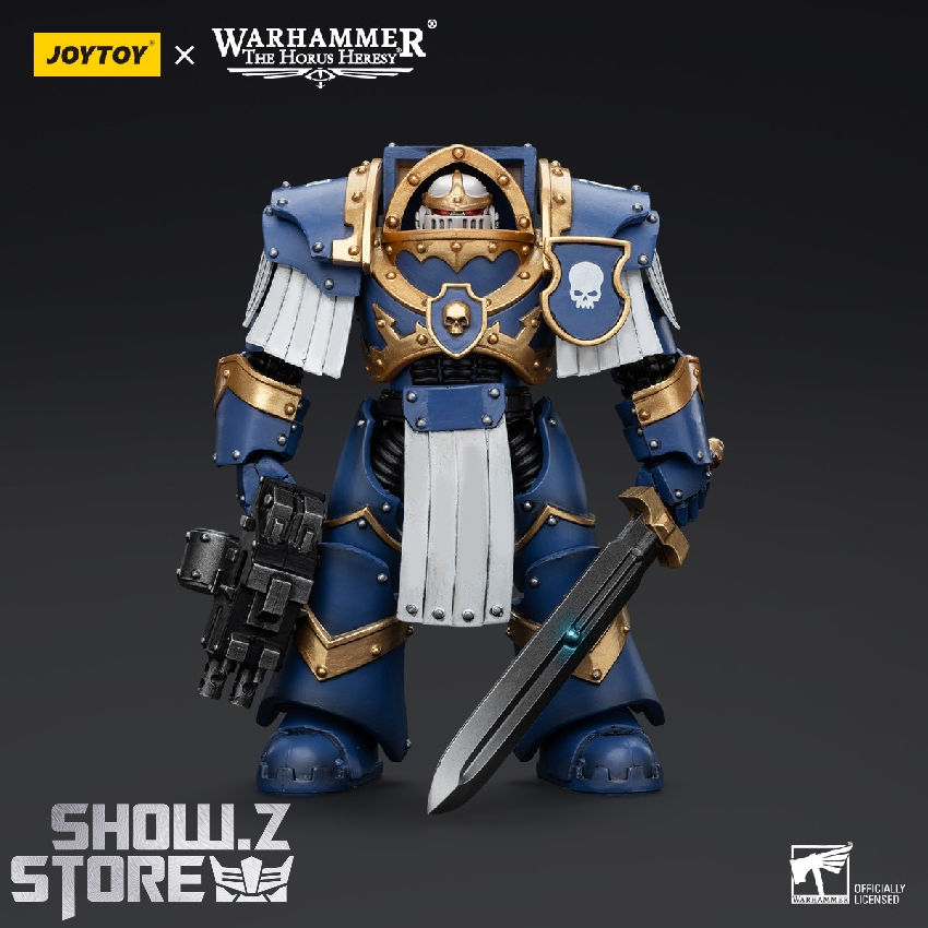 Ultramarines warrior displaying ornate shoulder armor tactical combat gear Ultramarines warrior displaying ornate shoulder armor tactical combat gear