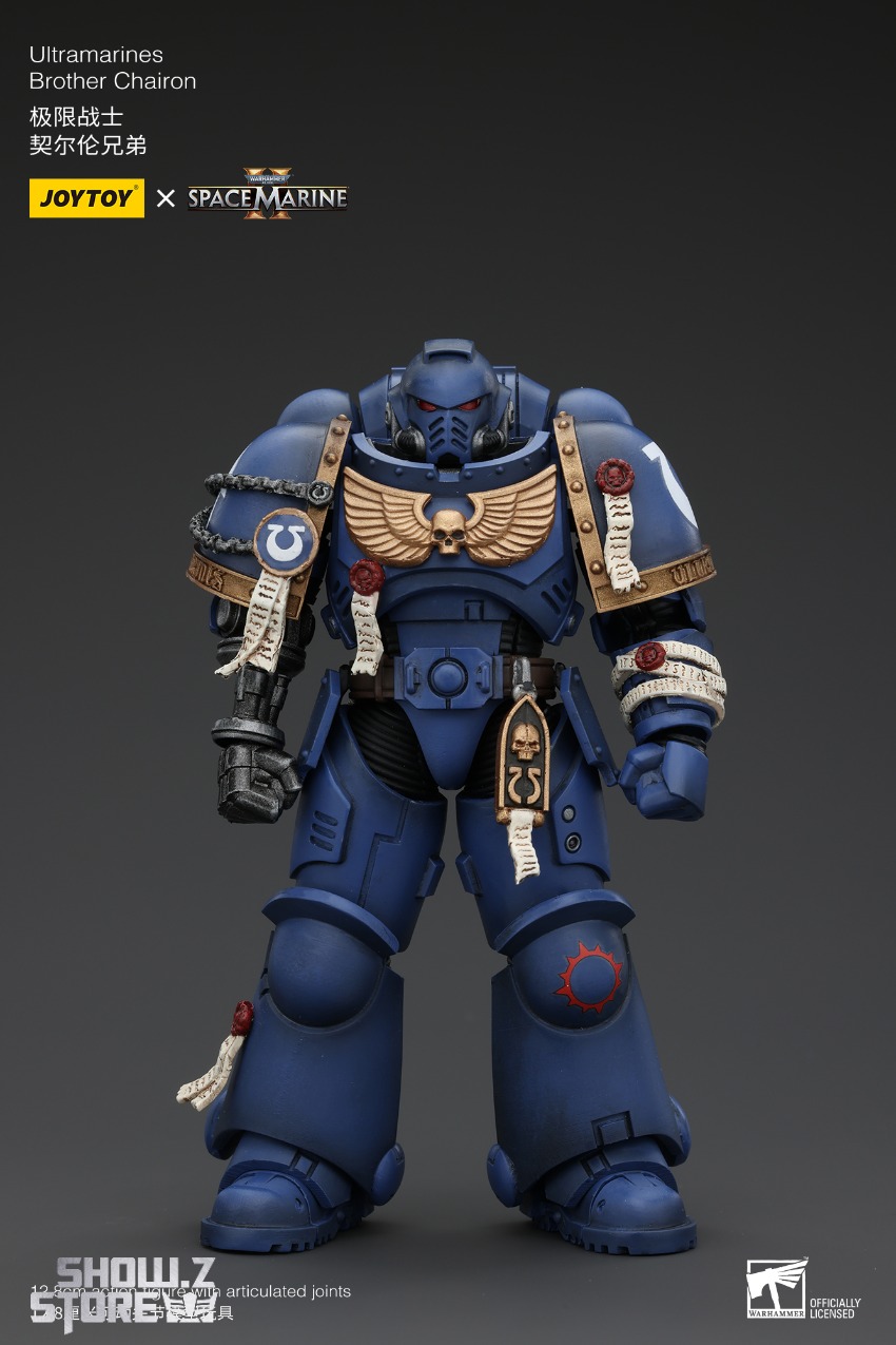 Ultramarines soldier blue armor bald head expression close-up Ultramarines soldier blue armor bald head expression close-up