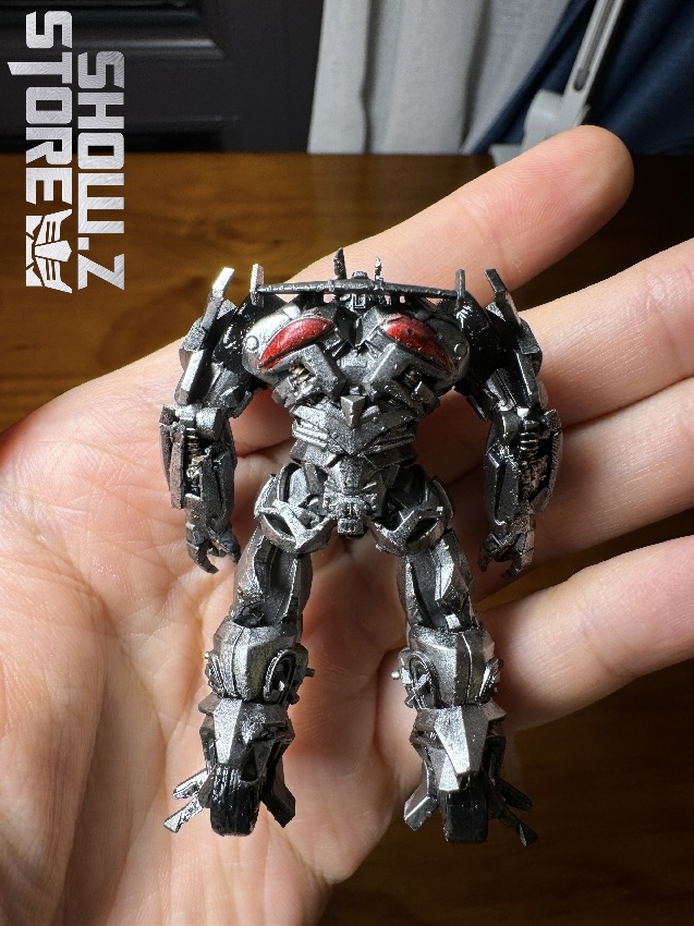 Ultra tiny 3D printed Jazz transformer metallic silver robot figure Ultra tiny 3D printed Jazz transformer metallic silver robot figure