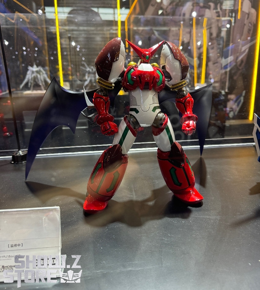 Red and black transforming mecha in forest with energy effects Red and black transforming mecha in forest with energy effects