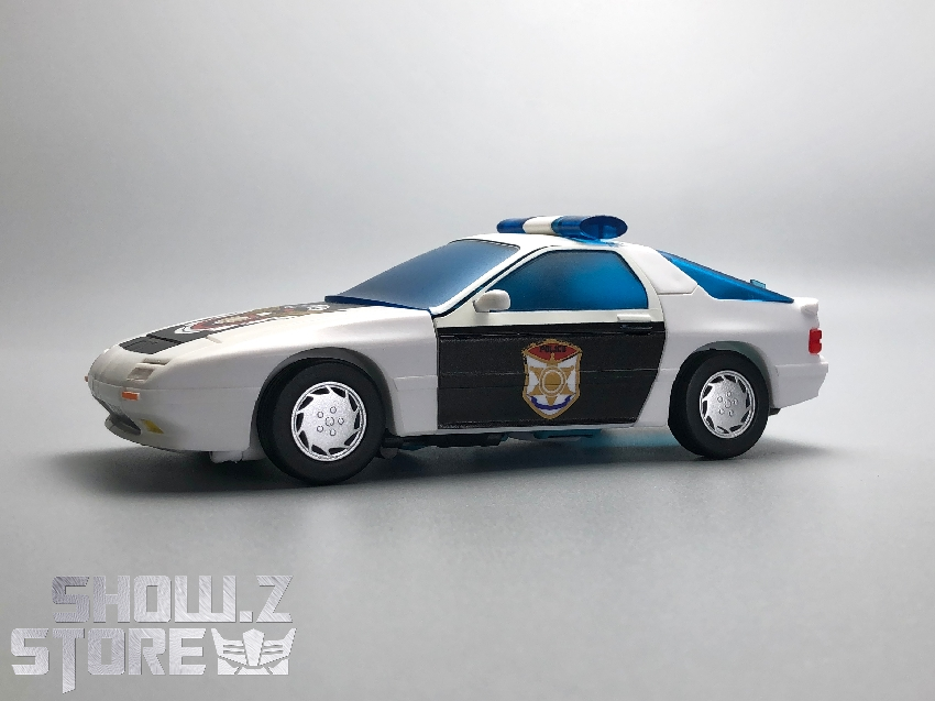 White police vehicle side view showing opening doors and interior White police vehicle side view showing opening doors and interior