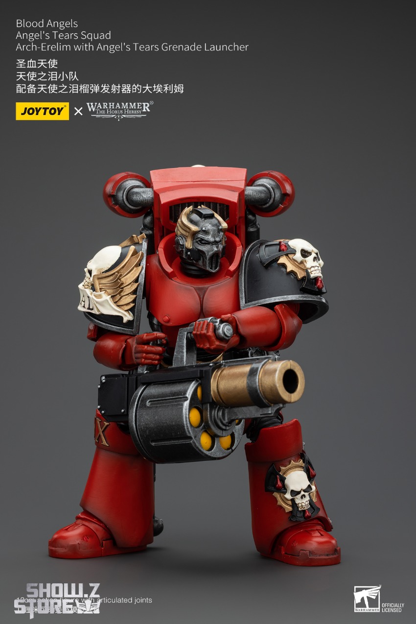 Heavily equipped Blood Angels soldier in full Warhammer 40K battle gear Heavily equipped Blood Angels soldier in full Warhammer 40K battle gear