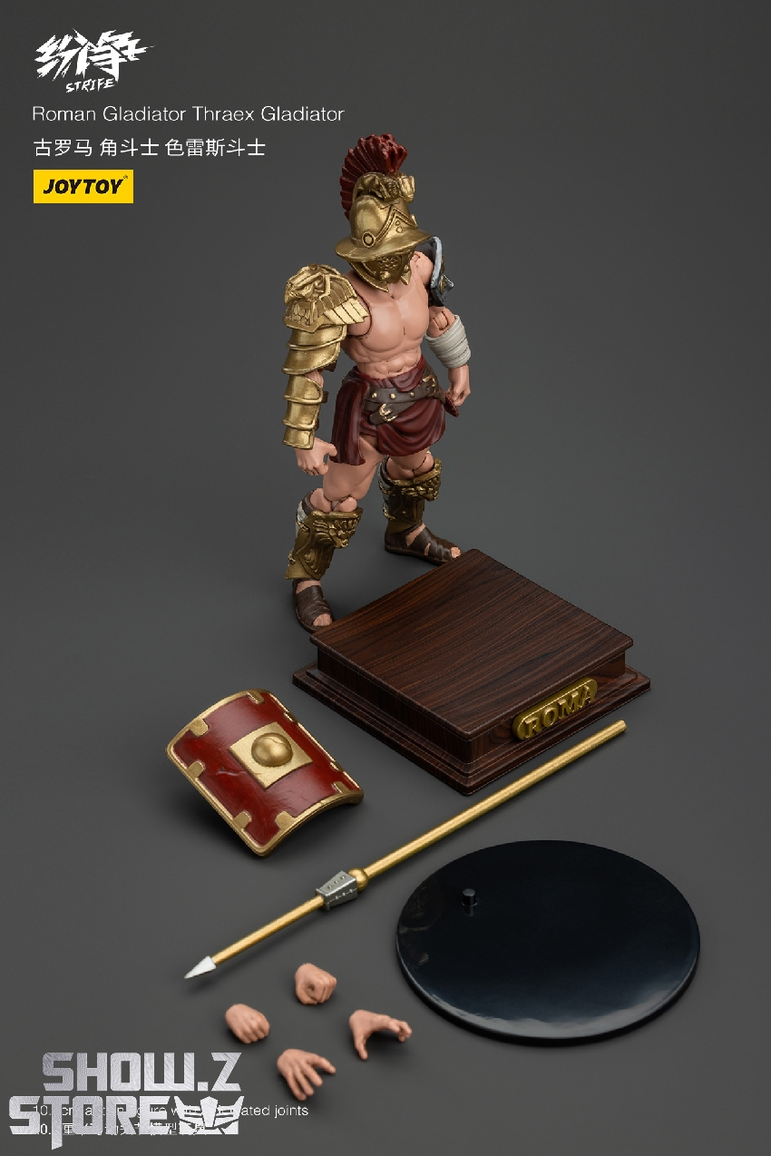 Ornate armored warrior in decorative gold and red colors Ornate armored warrior in decorative gold and red colors