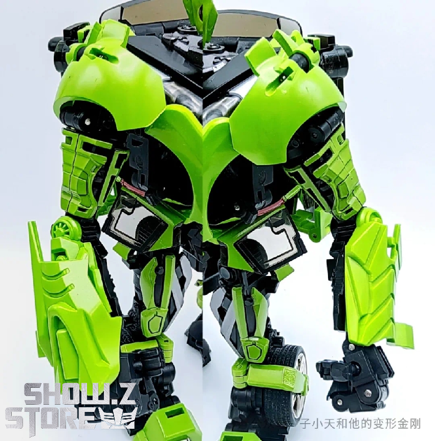 Green robot viewed from rear showing mechanical structure and joints Green robot viewed from rear showing mechanical structure and joints