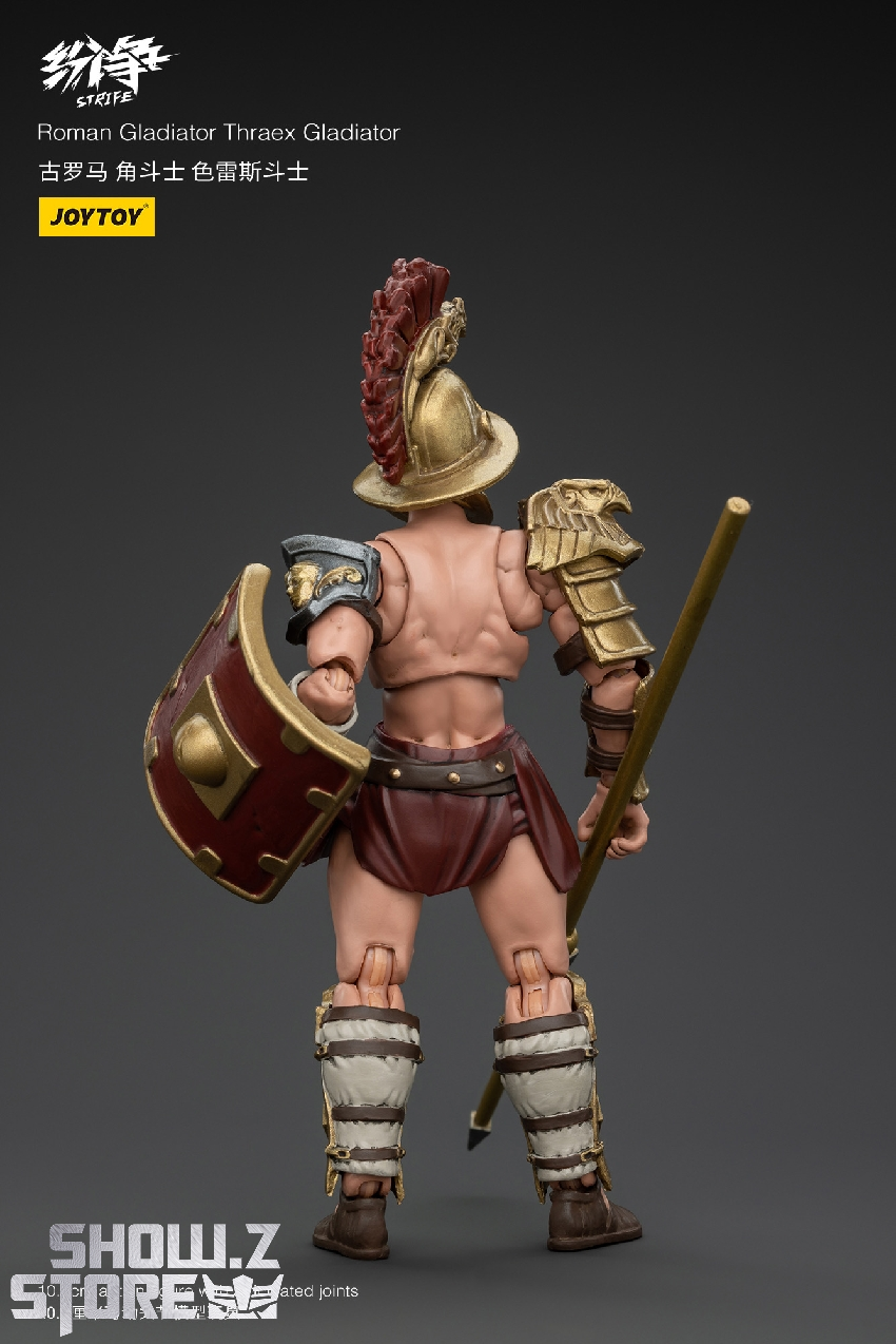 Thraex fighter displaying leg armor and ornamental equipment Thraex fighter displaying leg armor and ornamental equipment