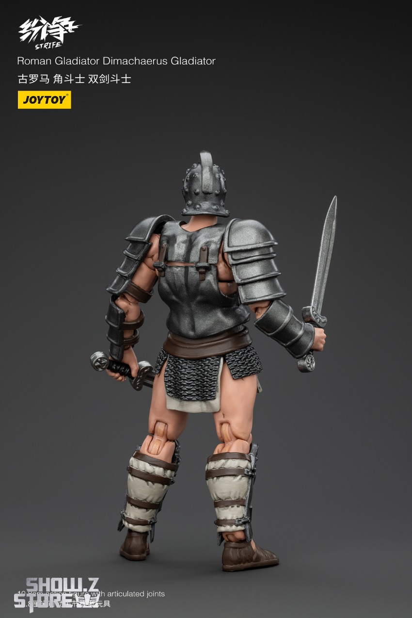 Articulated fighter figure with ornate chest plate gold details Articulated fighter figure with ornate chest plate gold details