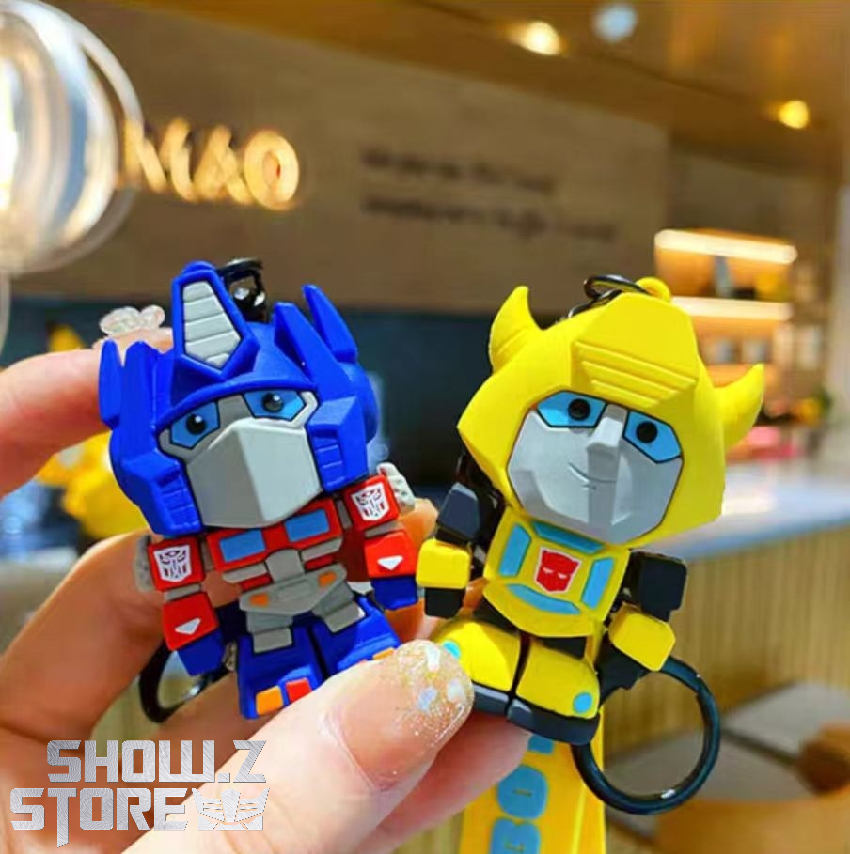 Transformers Optimus Prime keychains with attached metal rings chains Transformers Optimus Prime keychains with attached metal rings chains