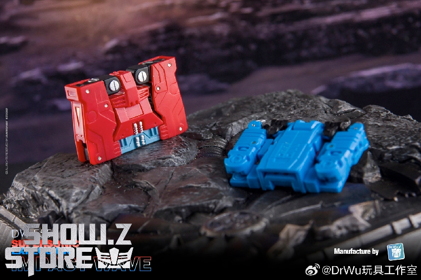 Red and blue transformation robot cassette in rocky landscape Red and blue transformation robot cassette in rocky landscape