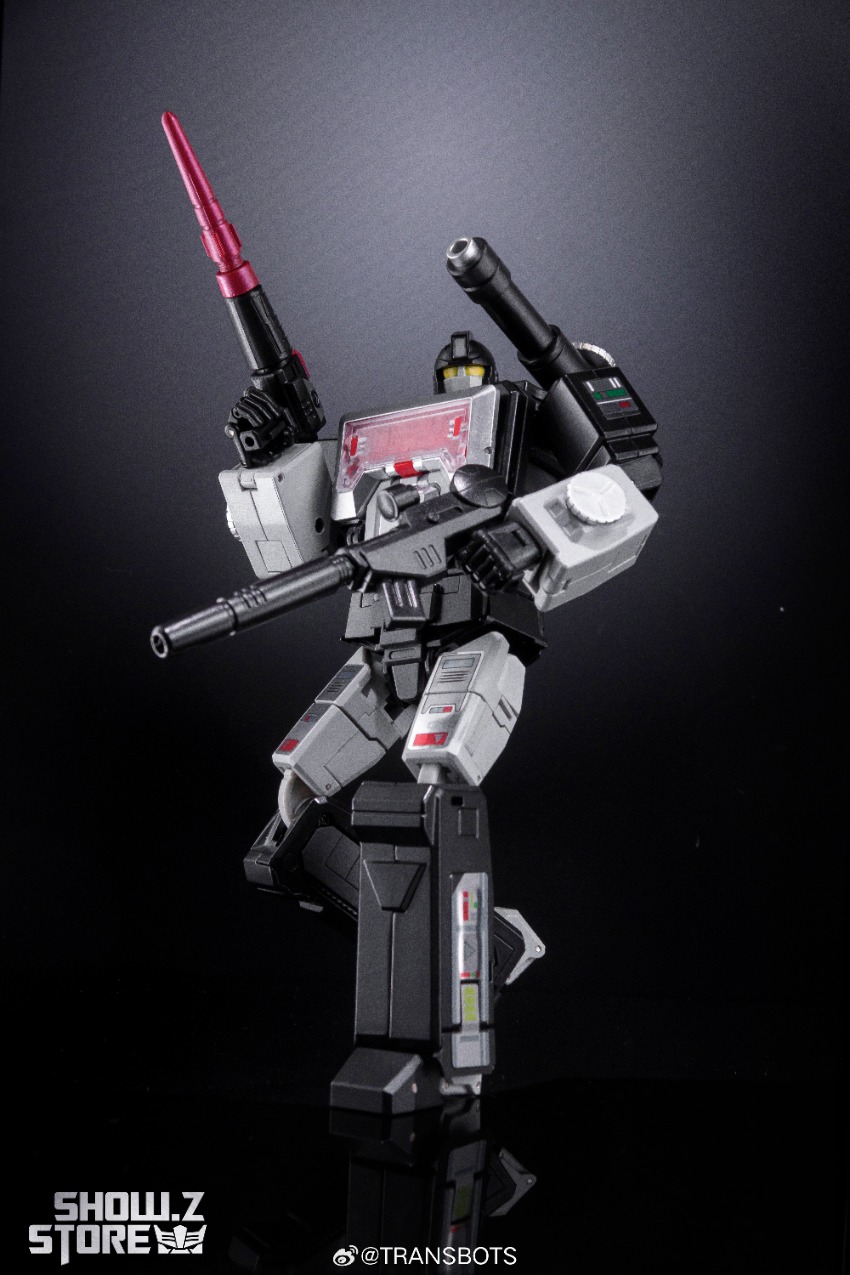 XTransbots Perceptor Black Version holding dual weapons overhead XTransbots Perceptor Black Version holding dual weapons overhead