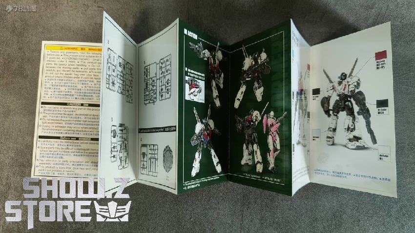 Trumpeter Wheeljack grey robot dynamic staff-wielding pose Trumpeter Wheeljack grey robot dynamic staff-wielding pose