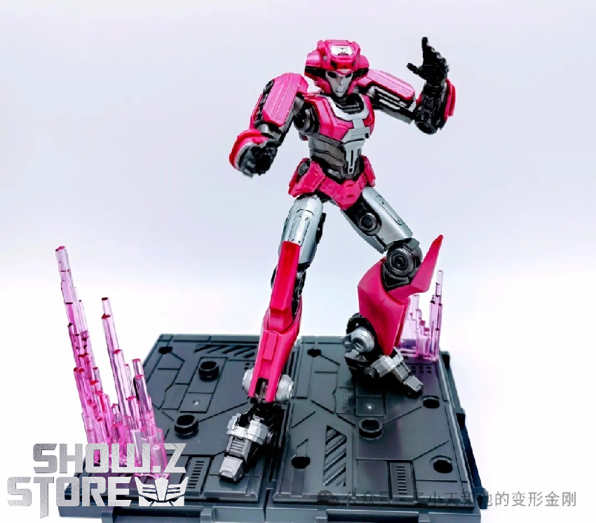 Pink Transformers robot figure with detailed armor plating and articulation Pink Transformers robot figure with detailed armor plating and articulation