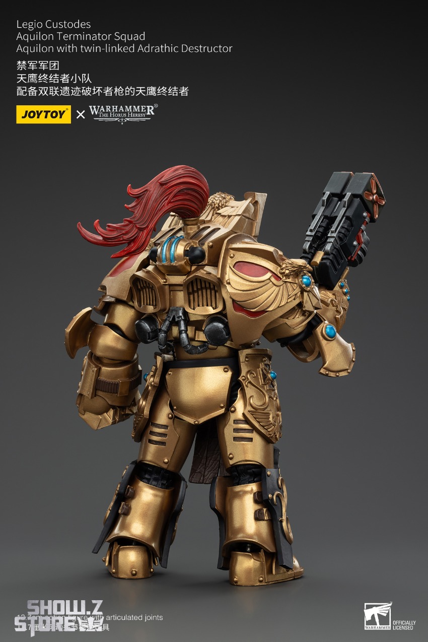 Golden armored warrior with dual-linked heavy weapons ornate shoulder decorations Golden armored warrior with dual-linked heavy weapons ornate shoulder decorations