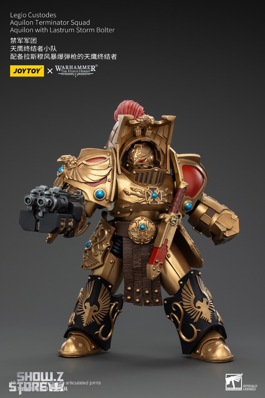 Warhammer 40K guardian figure elaborate golden armor precious stone inlays Warhammer 40K guardian figure elaborate golden armor precious stone inlays