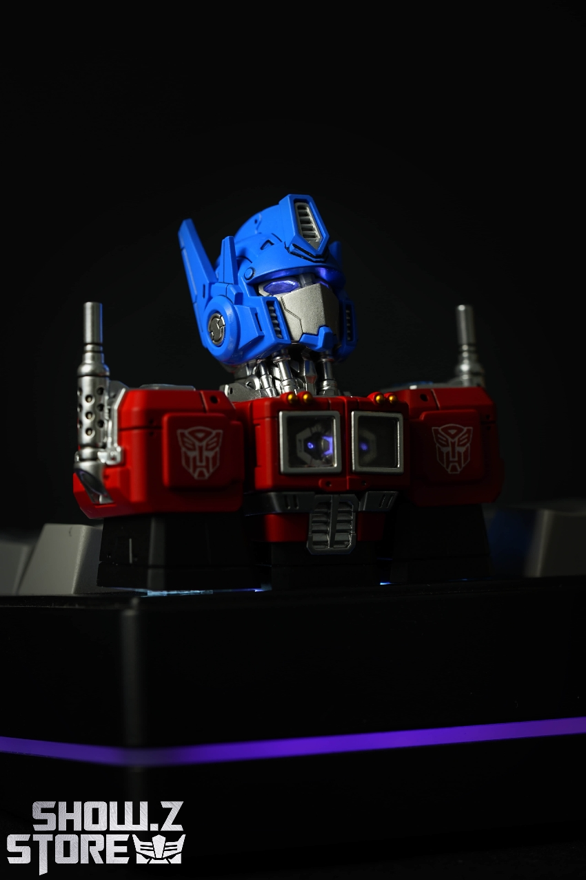 Cybertronix Optimus Prime keycap figure showing mechanical detail red base Cybertronix Optimus Prime keycap figure showing mechanical detail red base