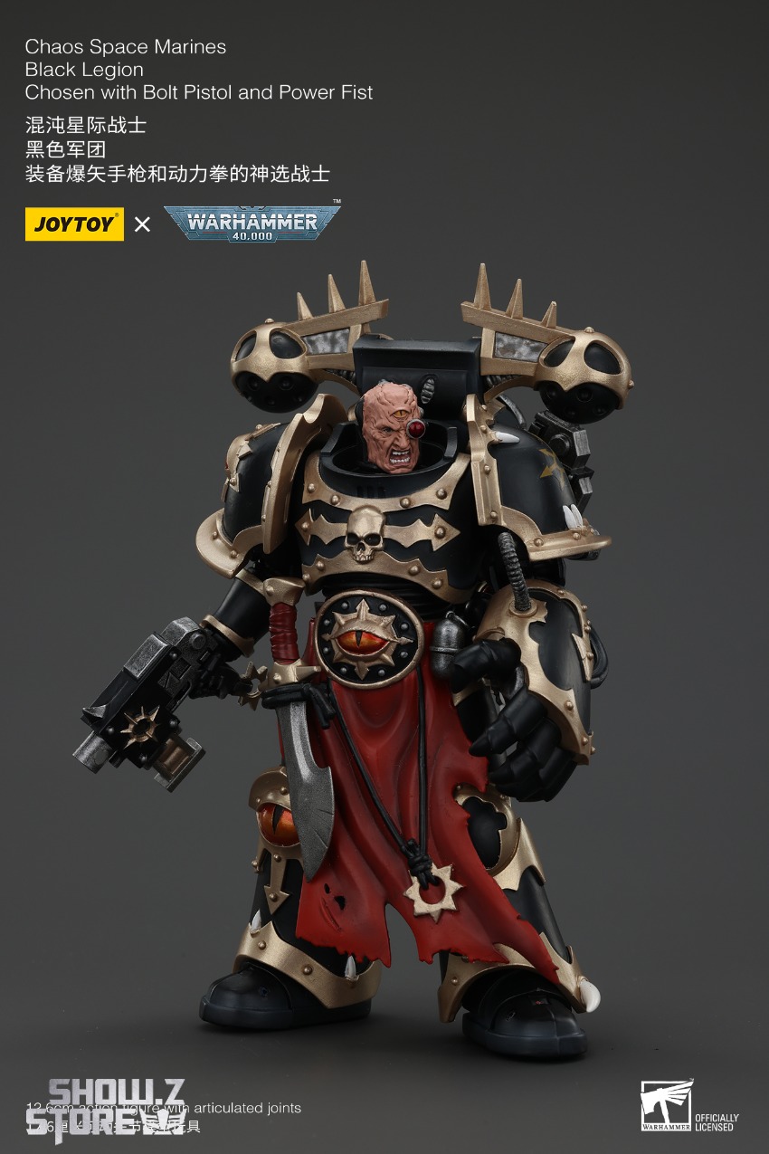 Chaos marine with black and tan armor plating Chaos marine with black and tan armor plating