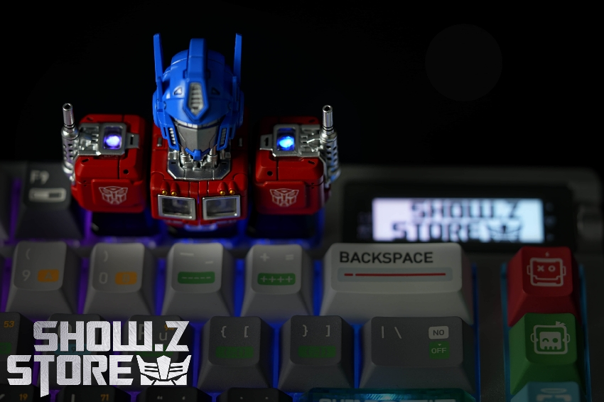 Top-down view blue red Optimus Prime keycap mechanical keyboard backlighting Top-down view blue red Optimus Prime keycap mechanical keyboard backlighting